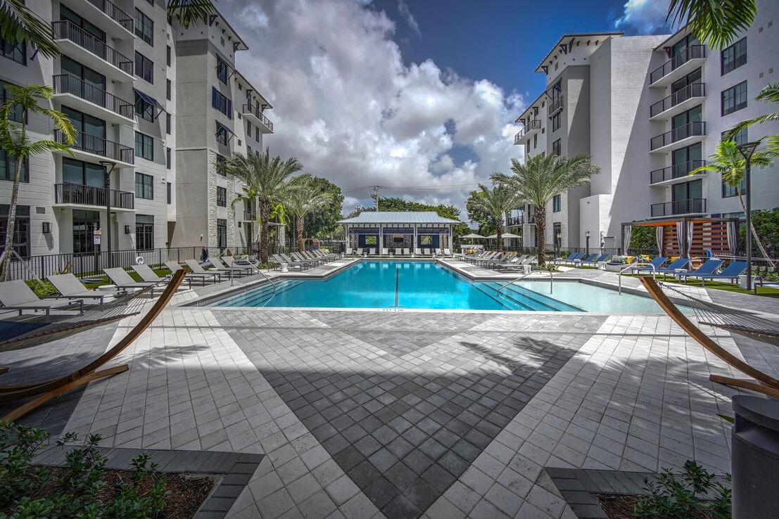 Pool deck with custom cabanas at MIDTOWN The Ellsworth