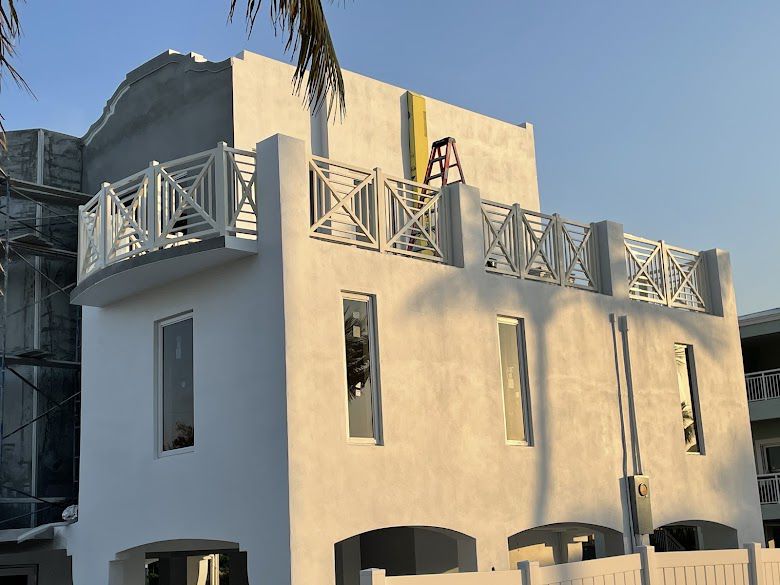 Exterior staircase with decorative aluminum railing