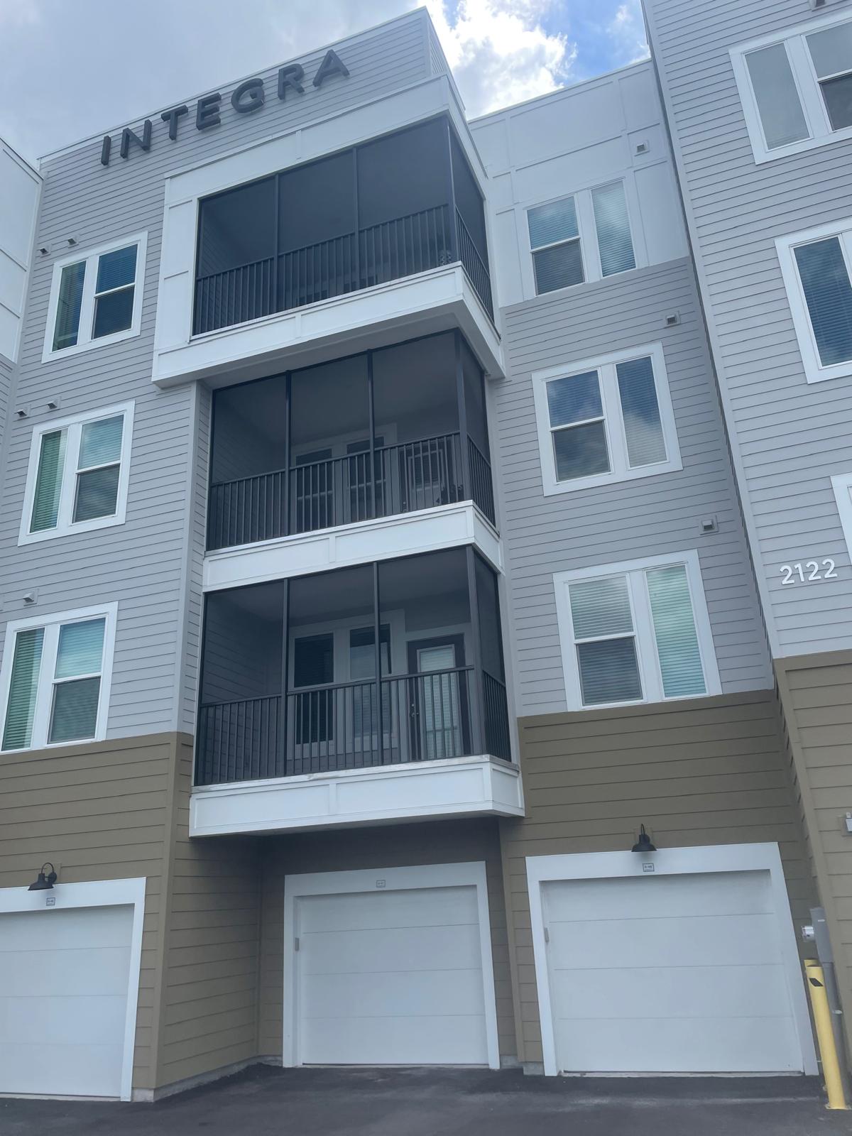 Multi-story exterior balcony railings on INTEGRA development