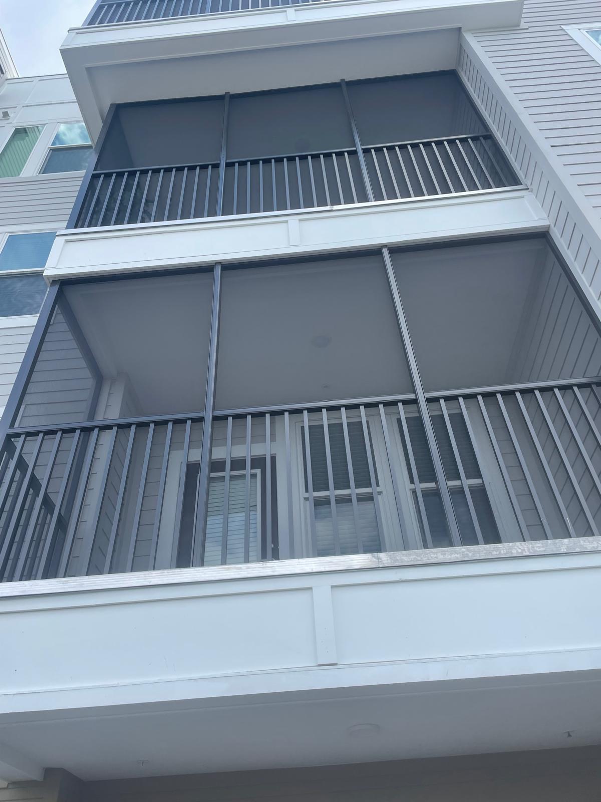 Stacked balcony railings on residential building