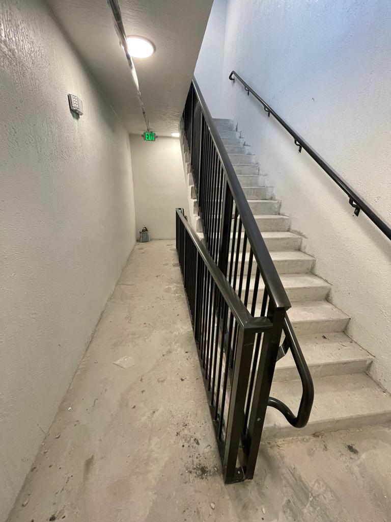 Industrial stair system with steel railing